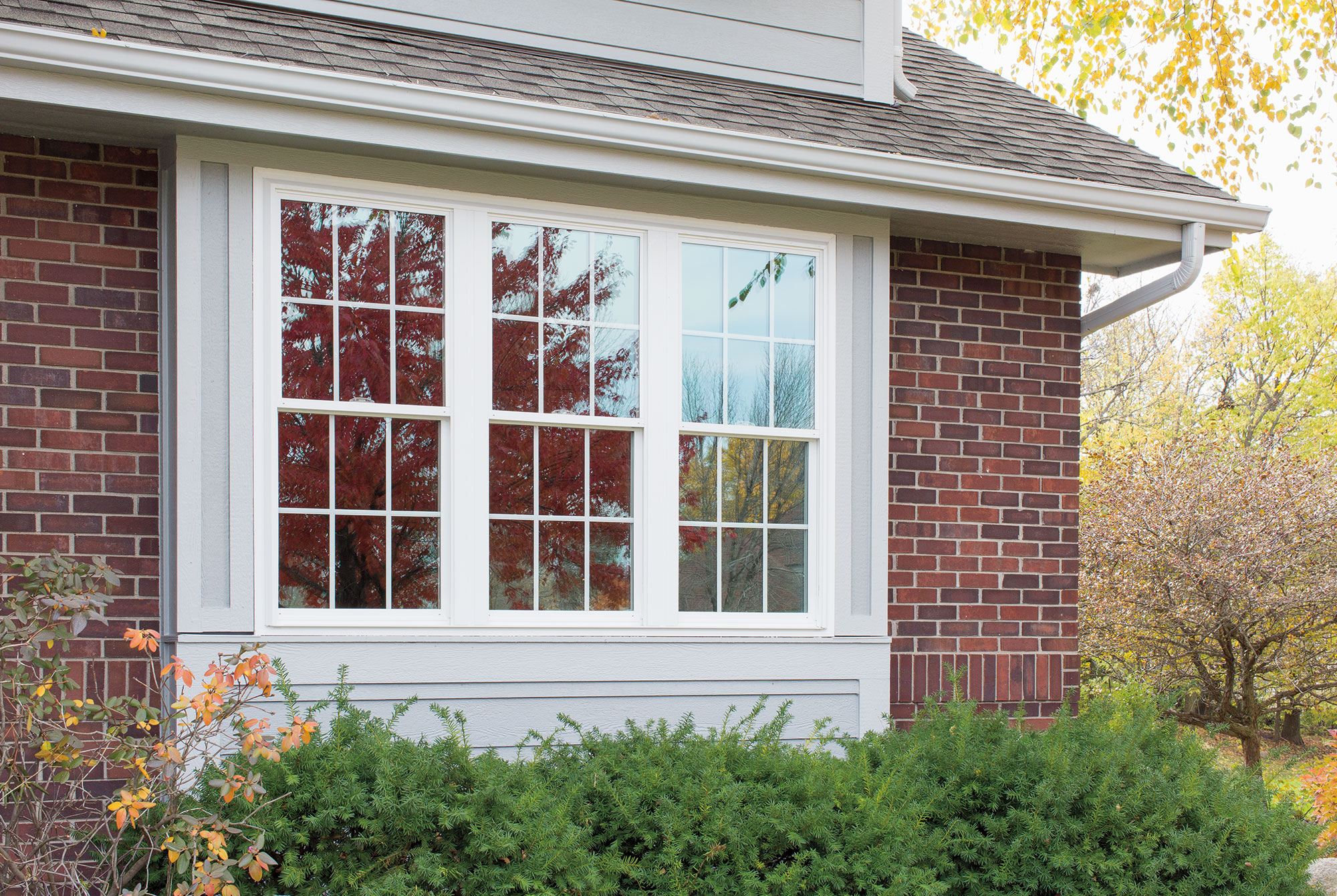 Traditional double-hung windows with grilles