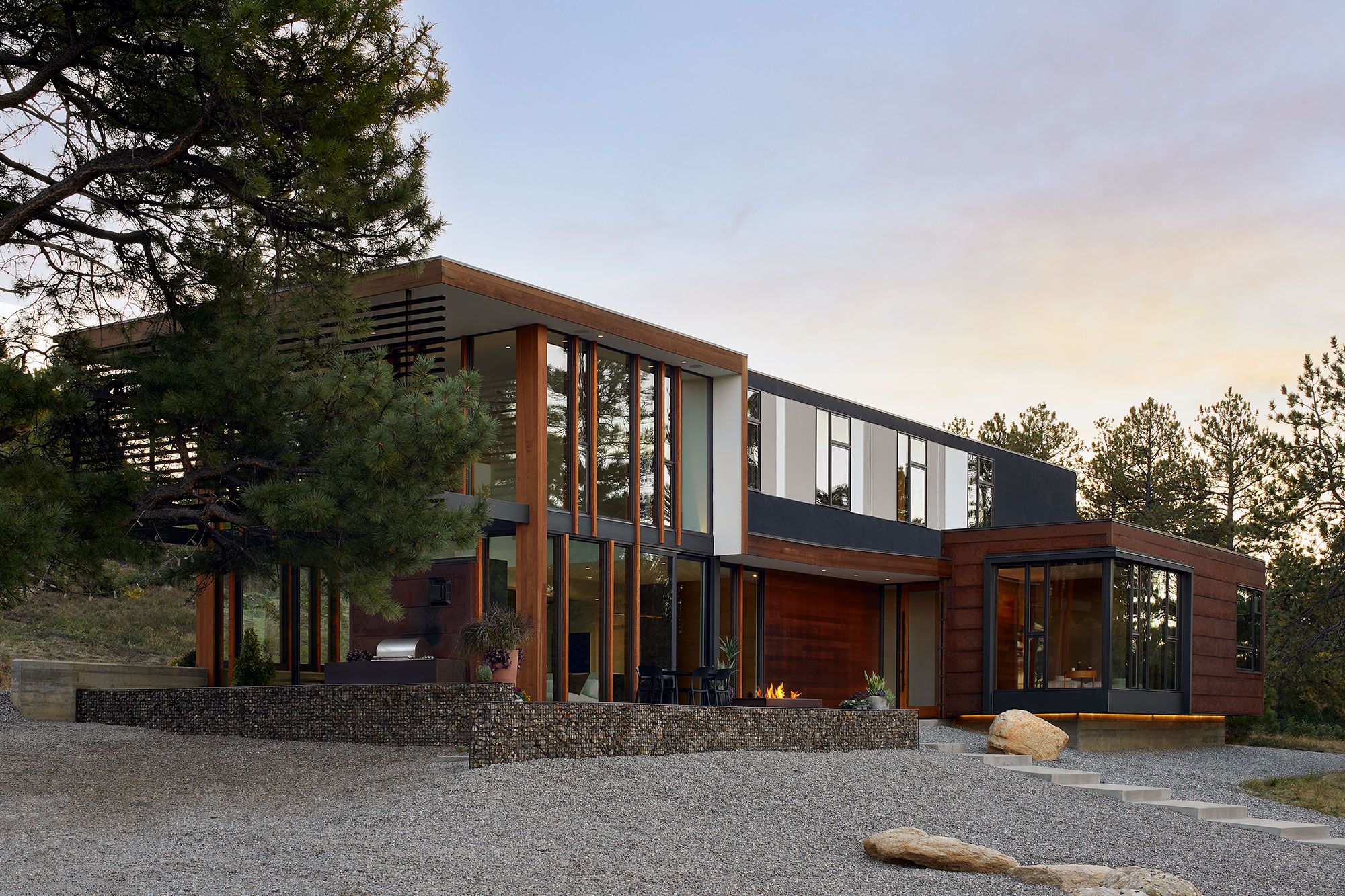 Modern home exterior with expansive picture windows